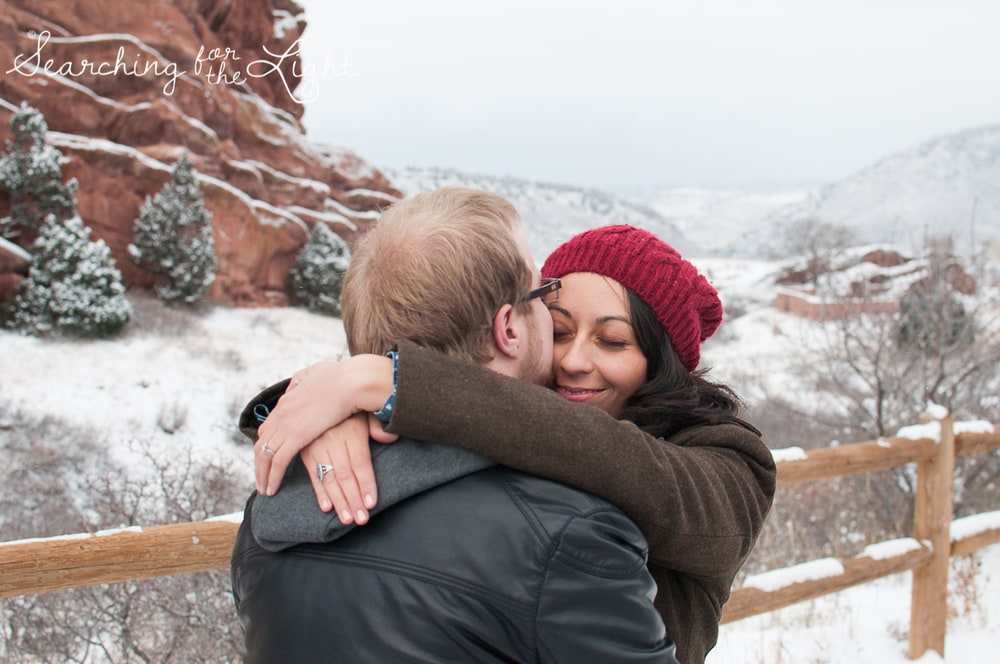 winter engagement photos at Red rocks by Denver wedding photographer searchingforthelight.com