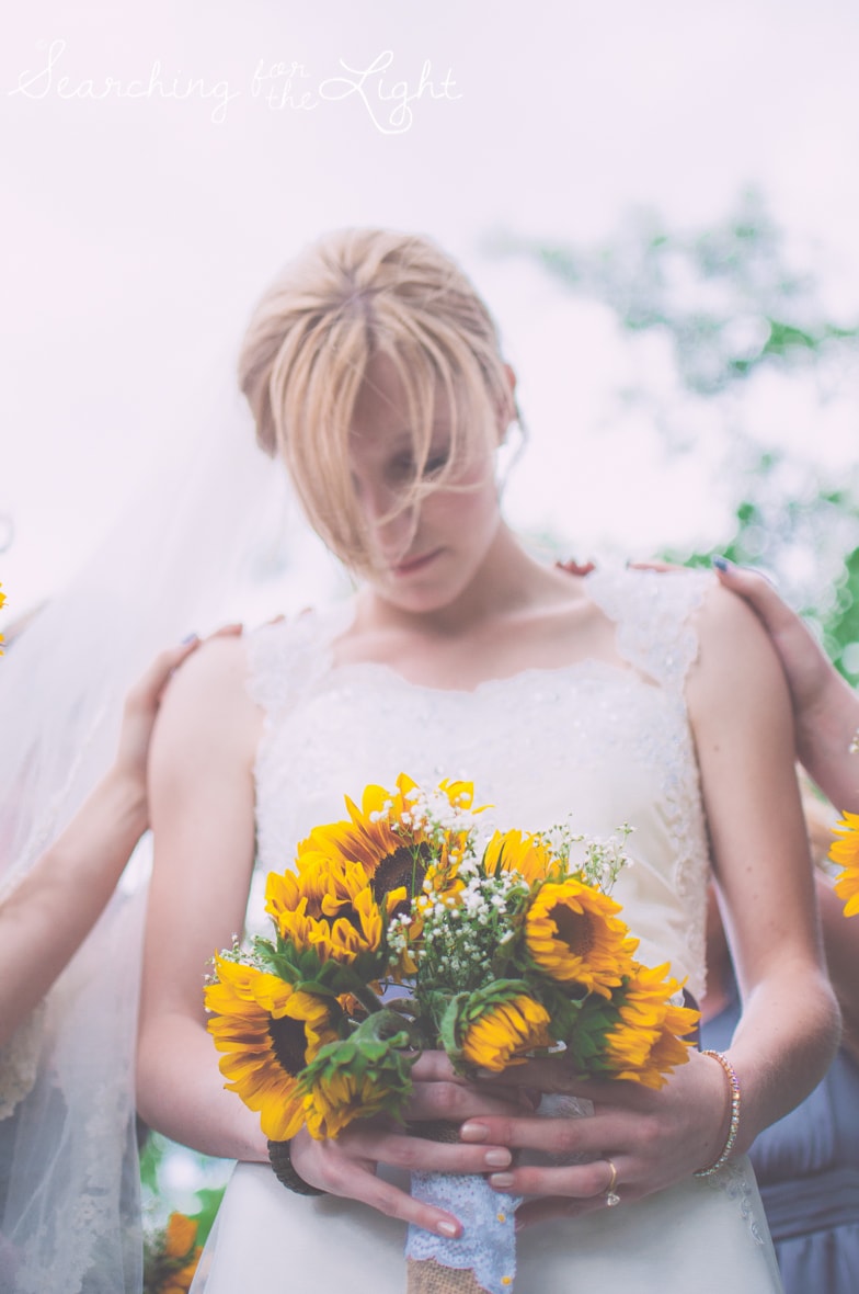 Praying Before Your Wedding Ceremony:  Wedding Tips from a professional Denver Wedding Photographer featuring photos of prayer before a wedding ceremony.
