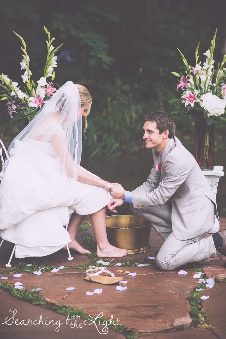 Foot washing at your wedding ceremony, lyons farmette wedding by colorado wedding photographer