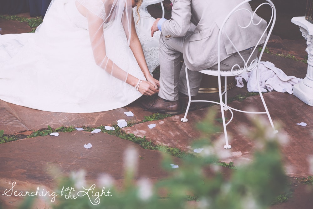 Foot washing at your wedding ceremony, lyons farmette wedding by colorado wedding photographer