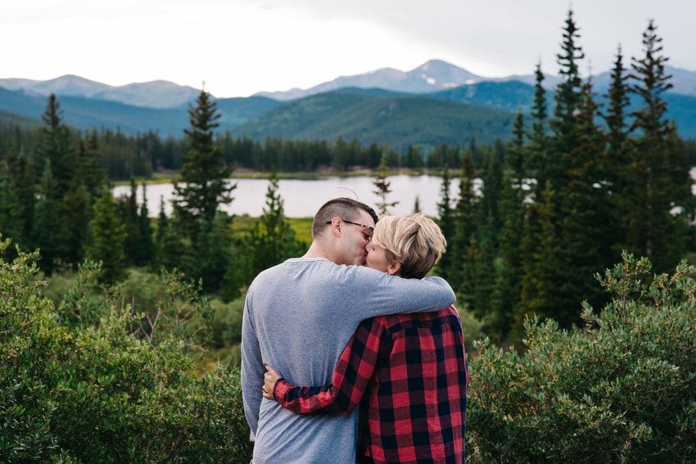Couple kissing at Echo Lake, an alpine lake in Colorado good for elopements and weddings