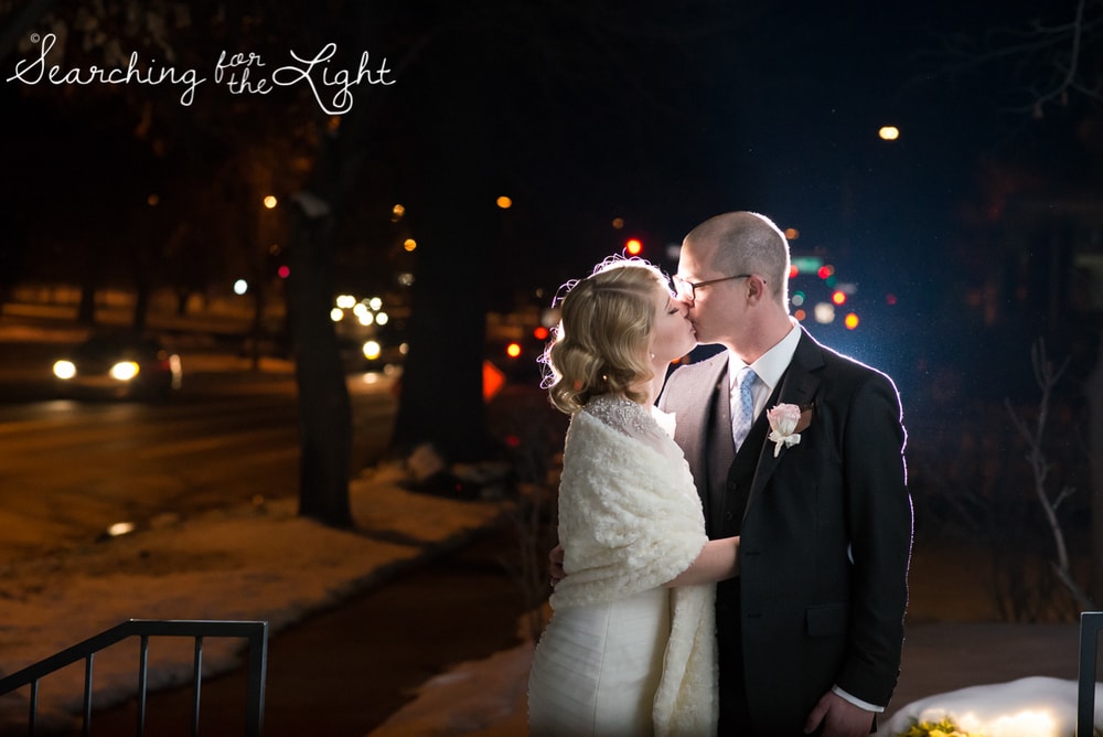 romantic wedding photo in the city during winter Parkside mansion wedding photo by denver wedding photographer, romantic evening wedding photo, city wedding