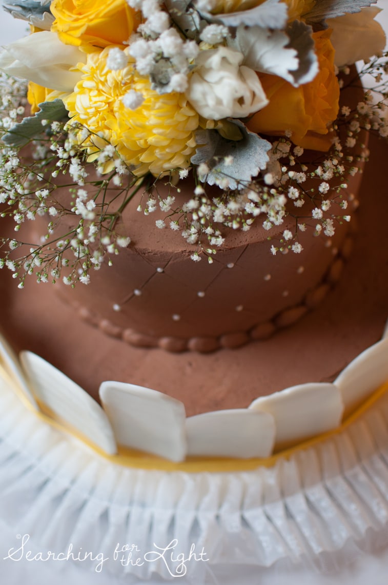 chocolate wedding cake yellow and gray wedding colors with baby's breath flowers