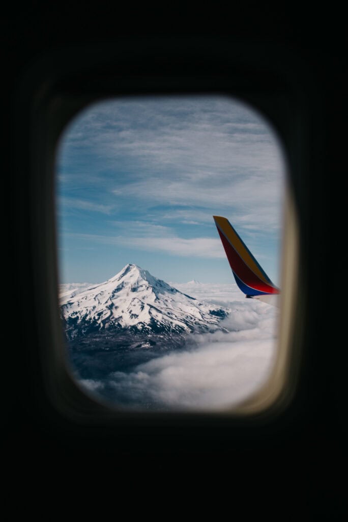 airplane window view photo by Lumalia