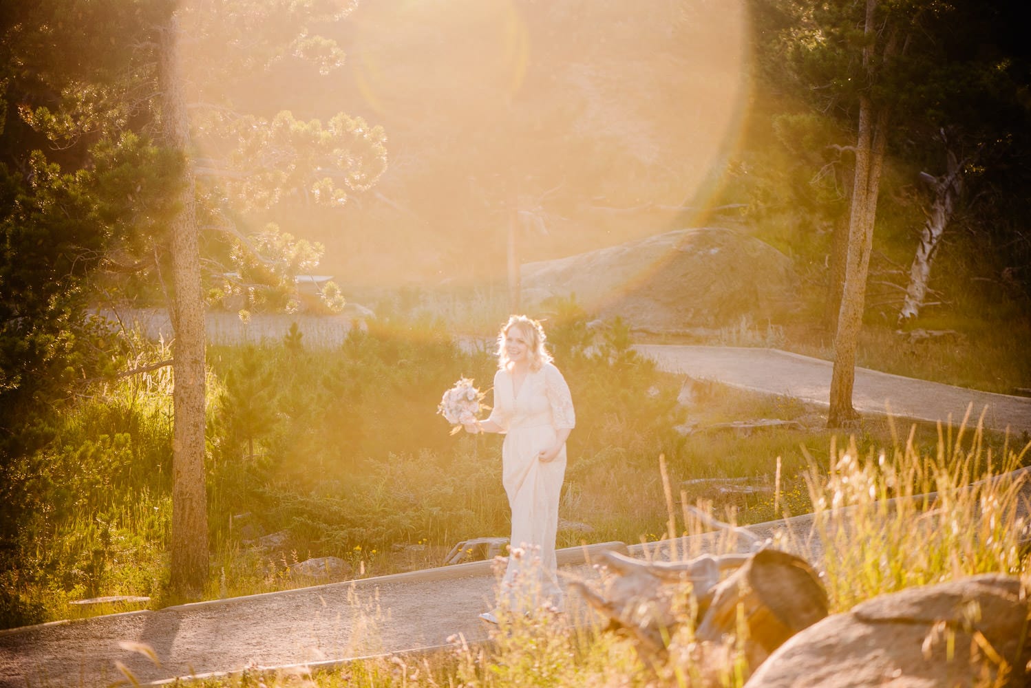 bride walking during golden hour at sprague lake