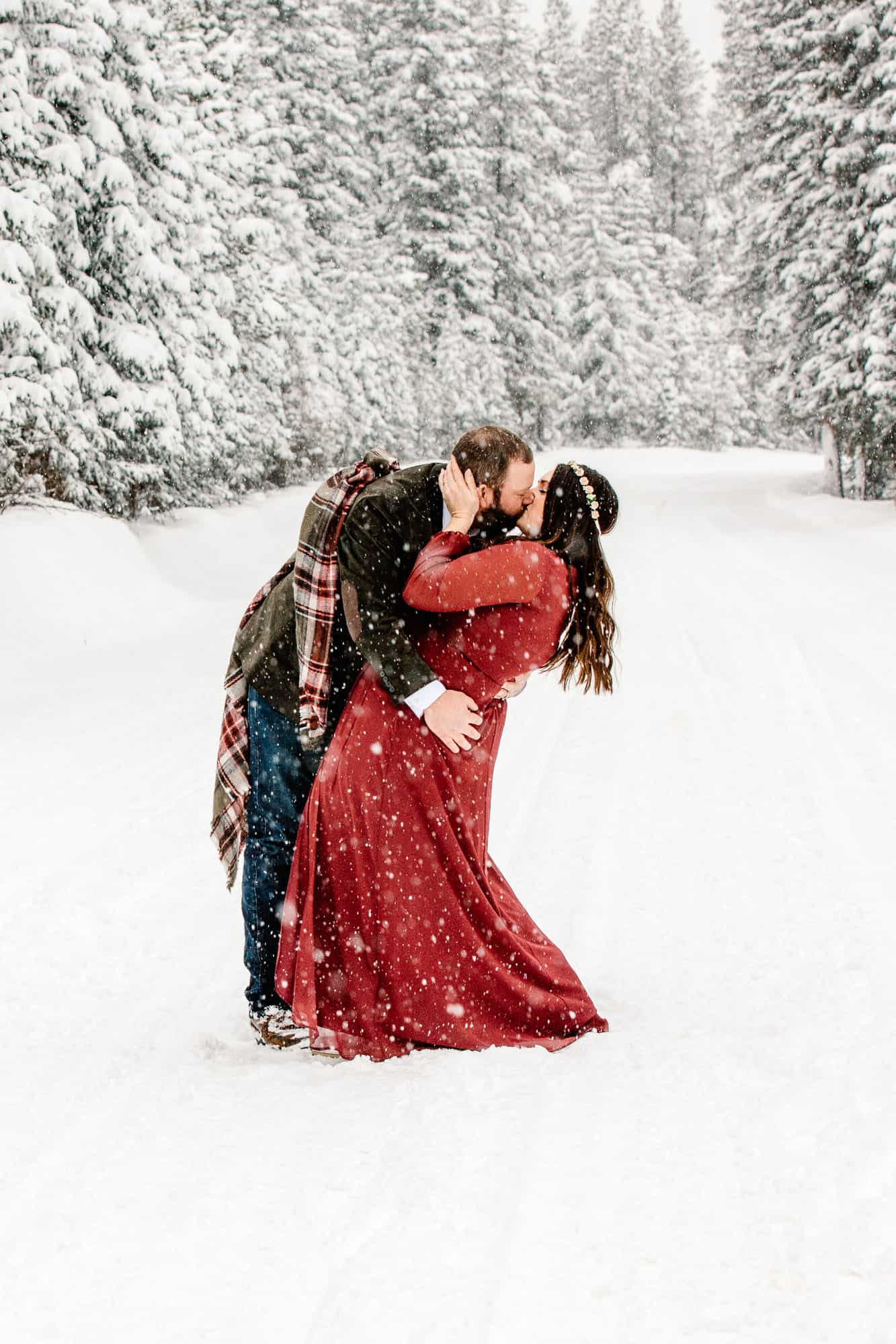 Couple getting eloped in Colorado in the winter wonderland