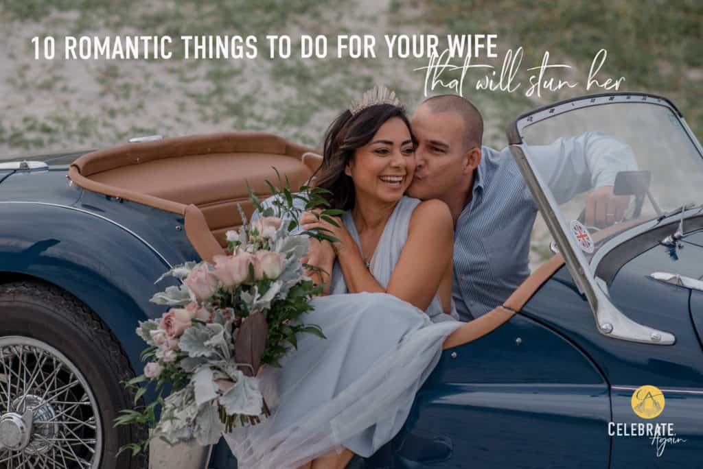 couple in a vintage car with wife's legs out and husband kissing her cheek having followed this romantic things to do for wife idea list