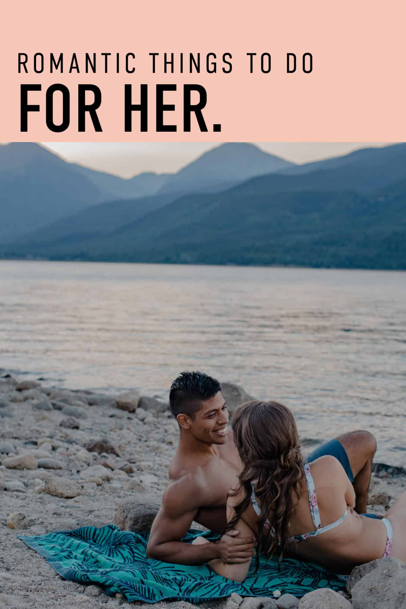 "romantic things to do for her couple snuggling on the beach of an alpine lake