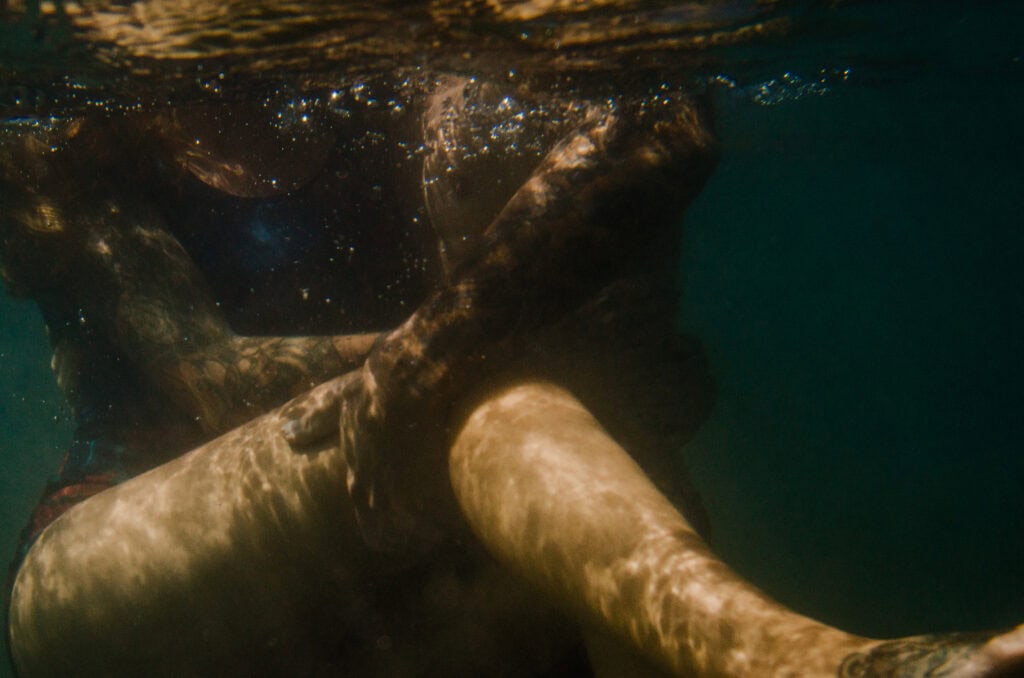 couple underwater on a passionate date romantic thing to do