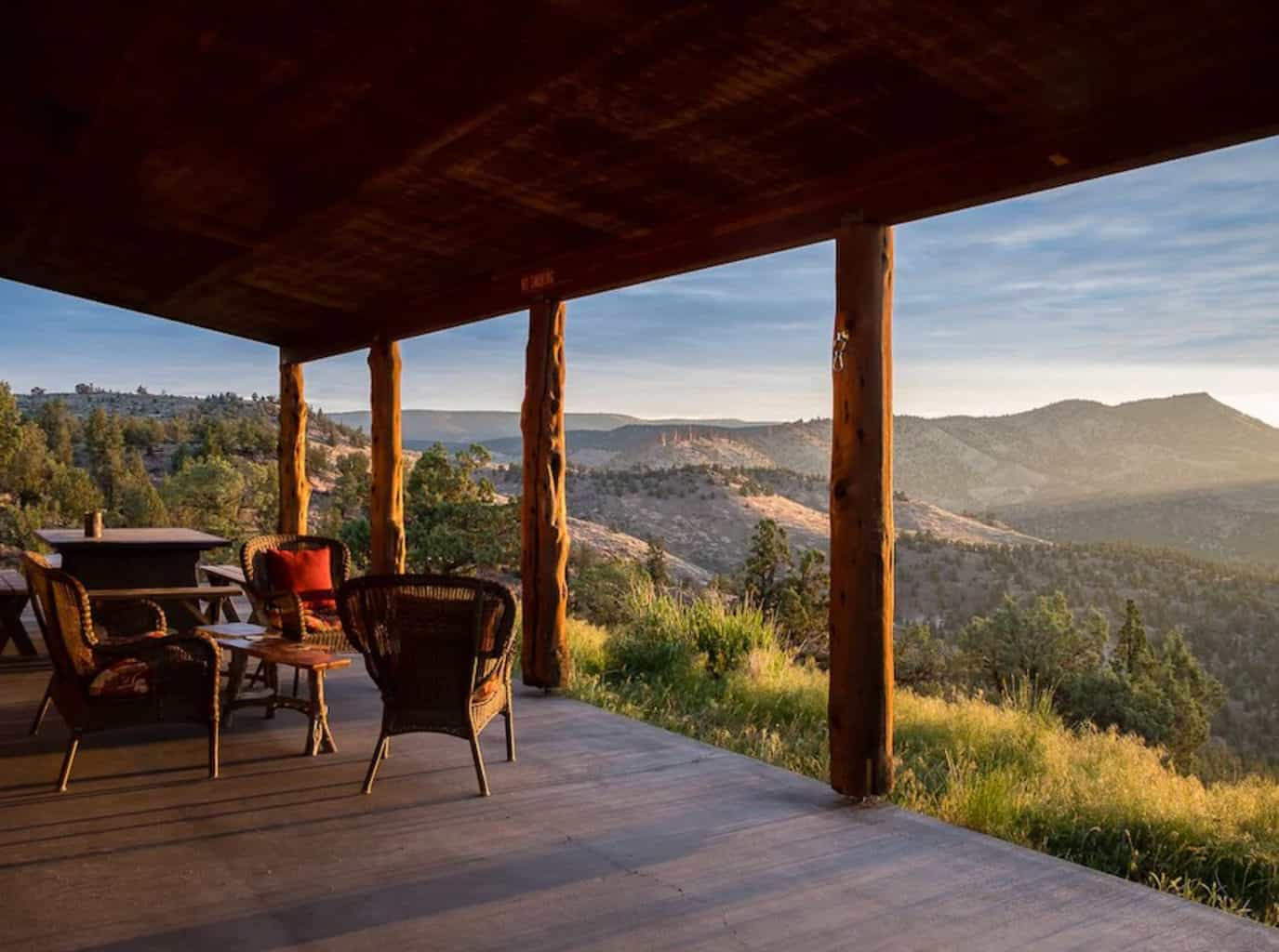 Sunset views on a patio looking out mountain views perfect for an intimate oregon airbnb wedding venue