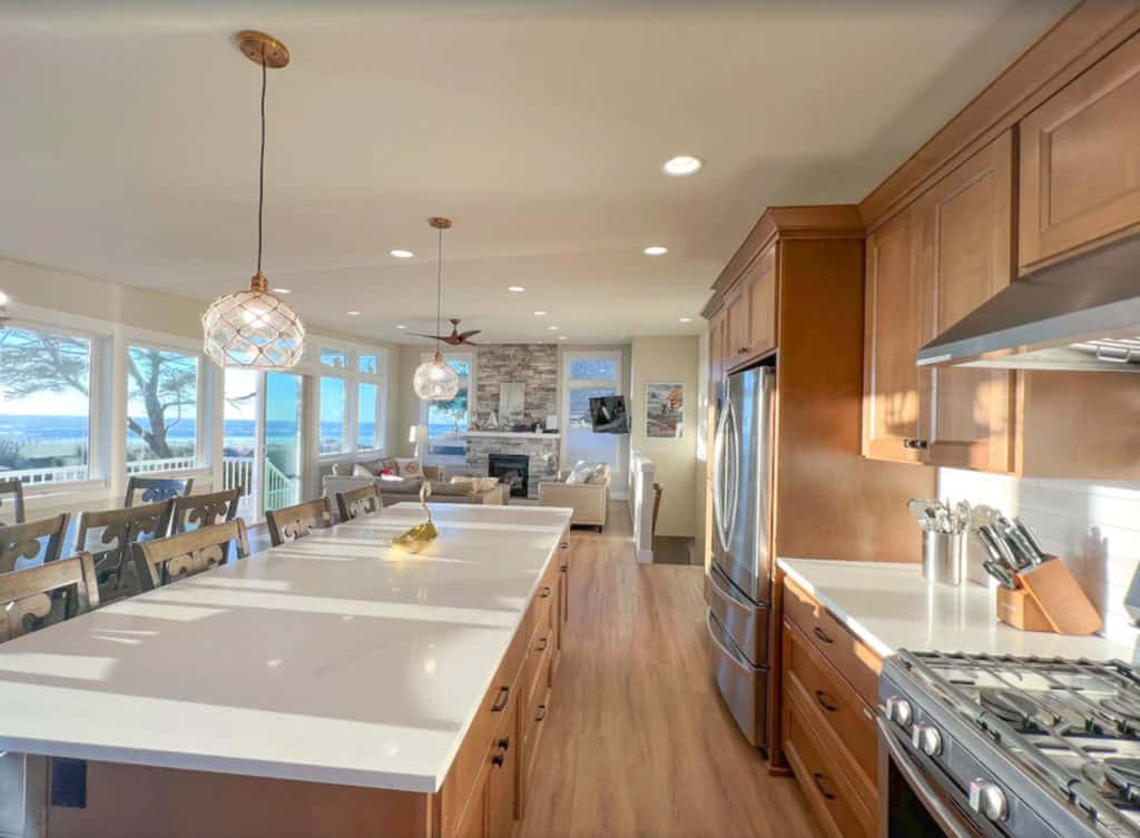 bright and light kitchen with ocean in the background