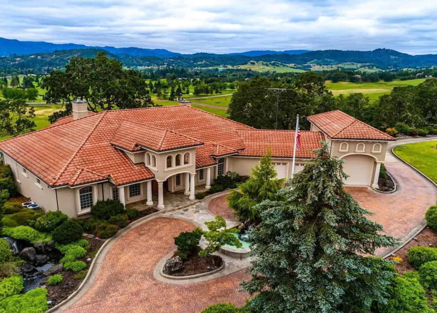 tuscan style villa with mountain views in the background an epic oregon airbnb wedding venue