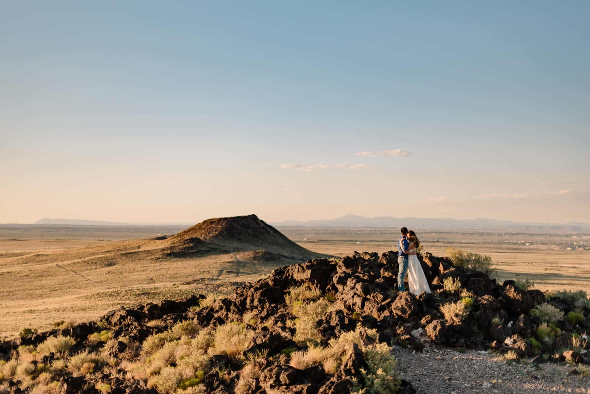 couple eloping in New Mexico exploring volcanos