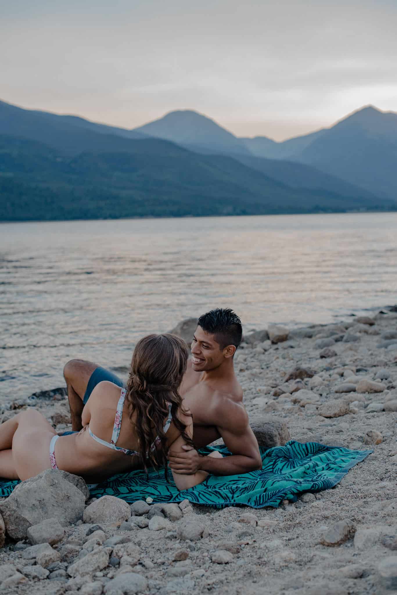 couple swimming on elopement day