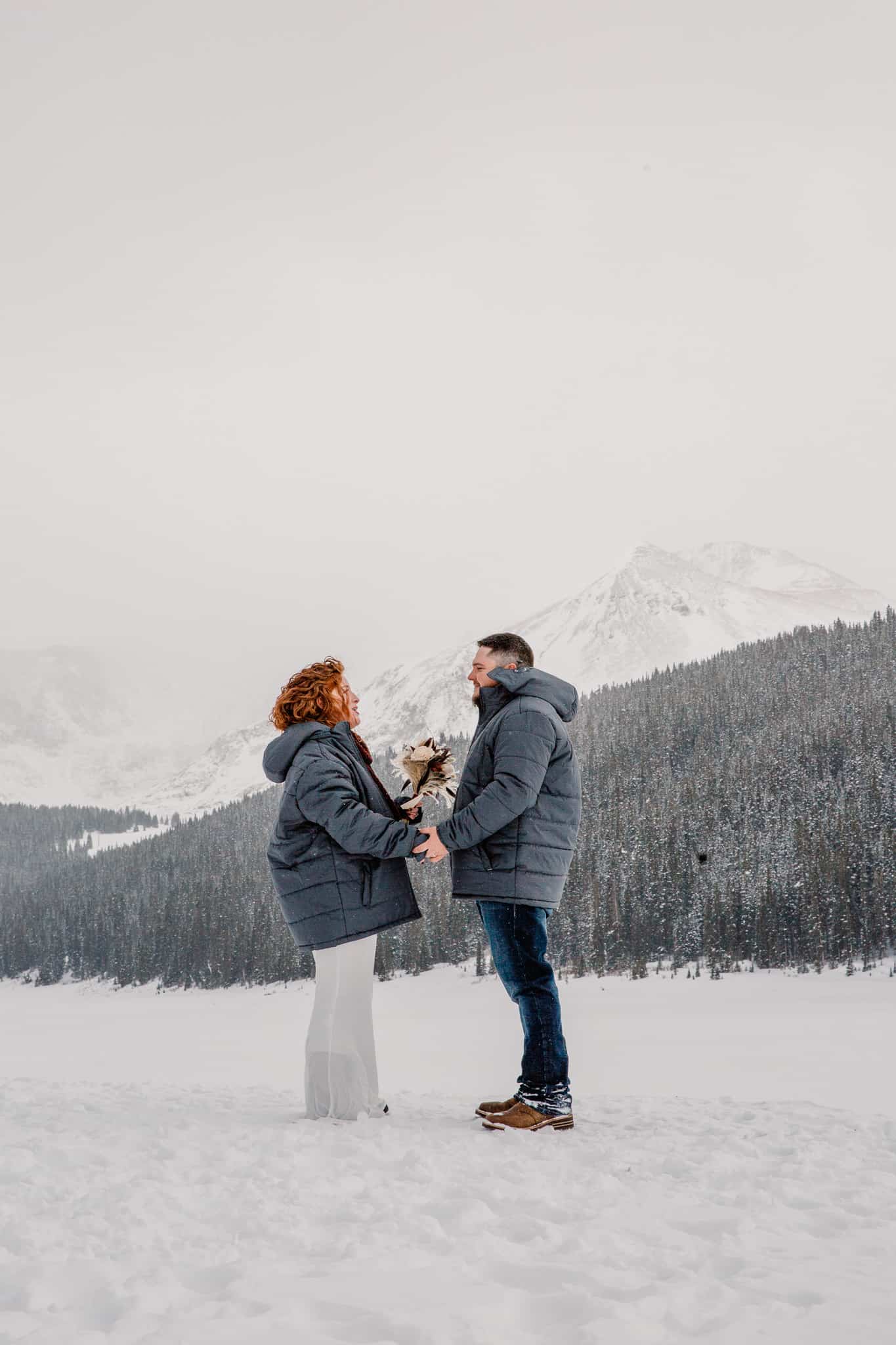 couple exchanging vows in winter