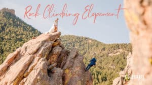 "rock climbing elopement" wedding couple rock climbing in wedding clothes