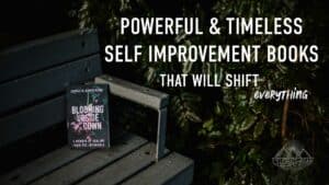 "Powerful & Timeless Self Improvement Books That Will Shift Everything" over an image of a book in healing called Blooming Upside Down siting on a rusty bench