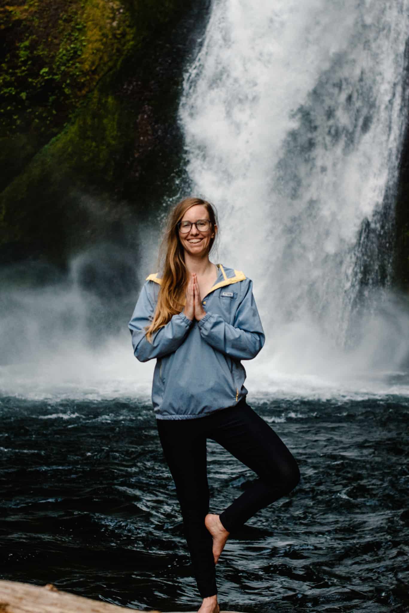 Lumalia in prayer hands for a women's retreat in Oregon and wellness experience outside of portland oregon