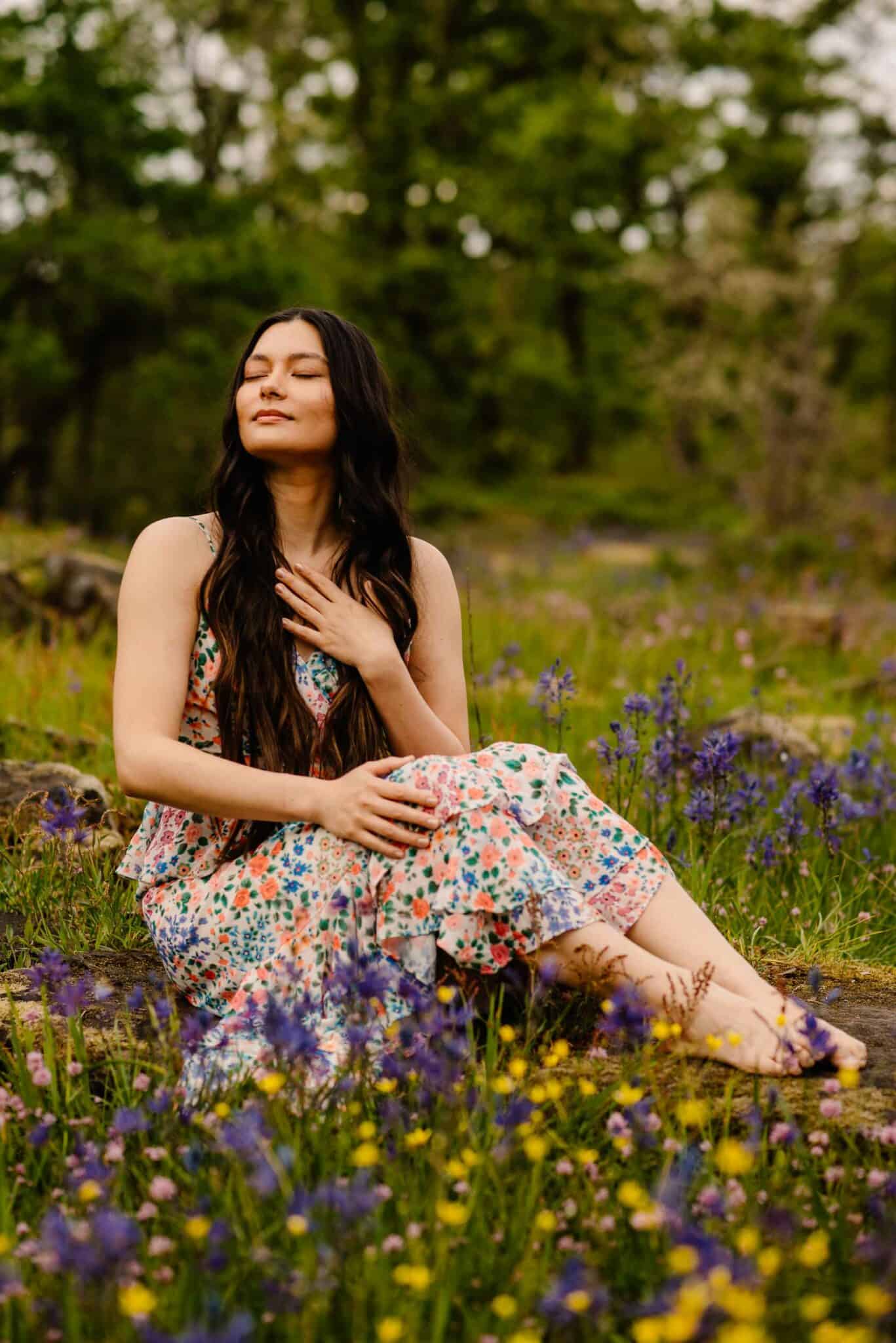 person placing hand on the heart for self care mental practices