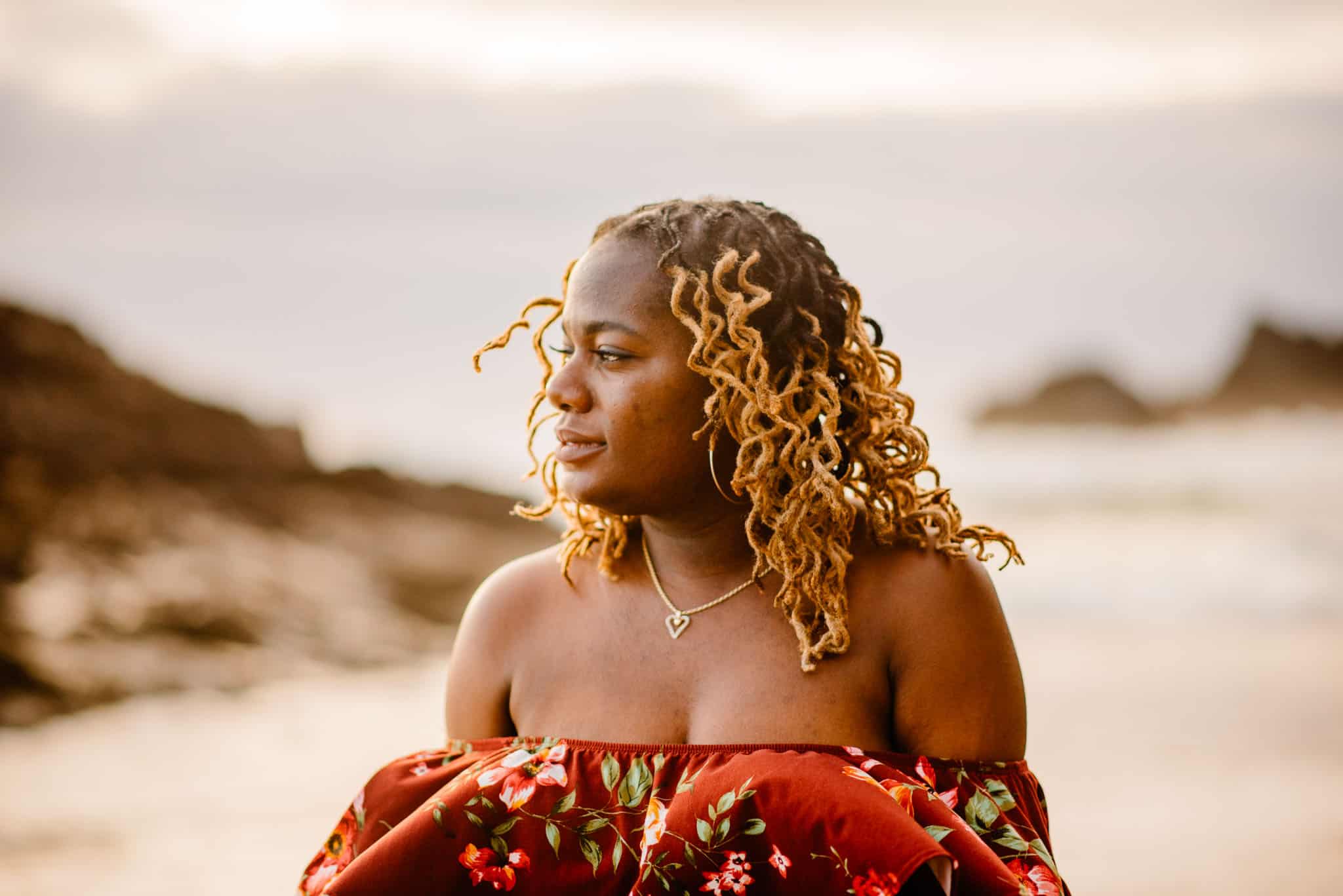 woman looking out in a natural environment for self care