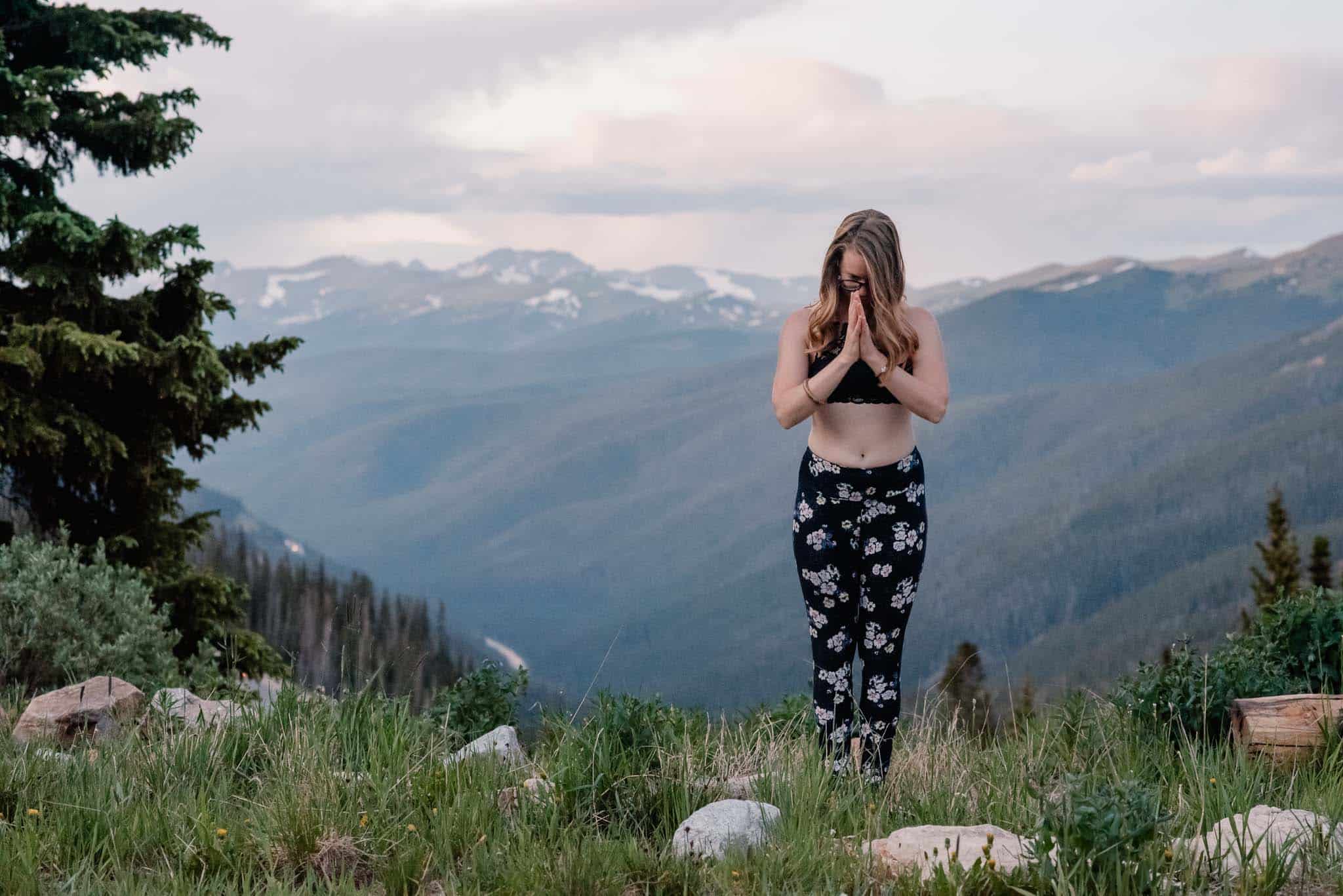 self care yoga pracitce on a mountain top