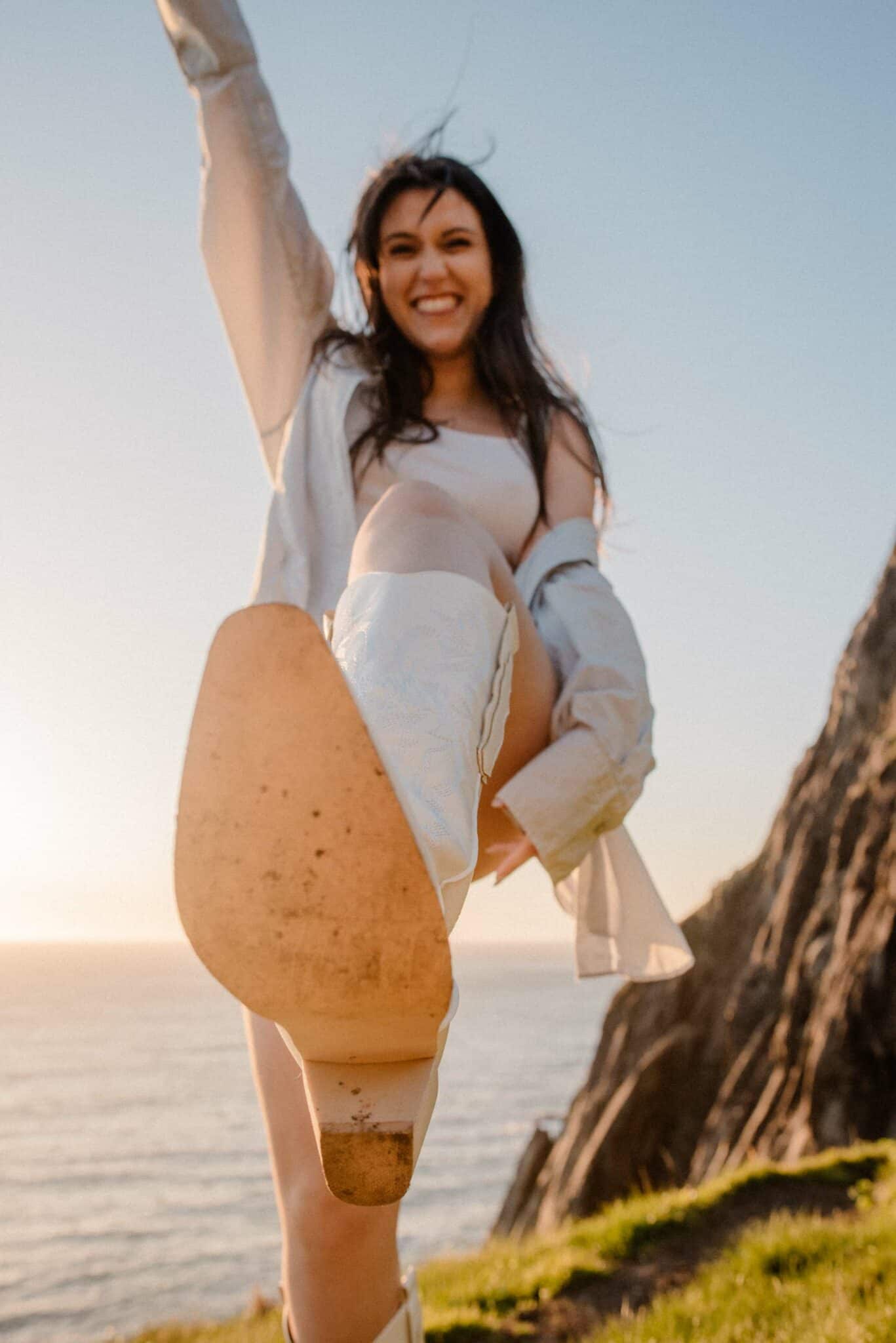 woman with a boot towards the camera