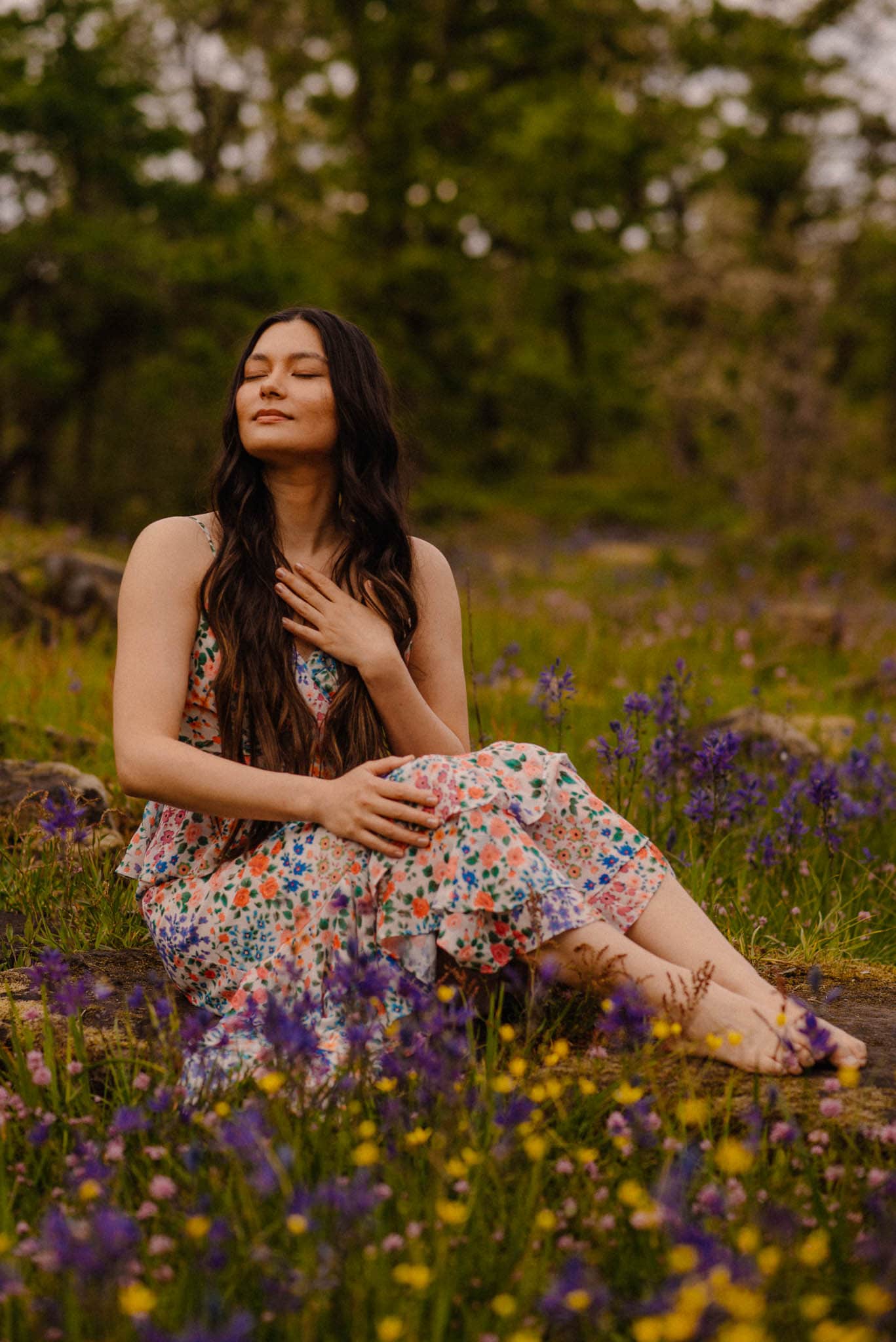 woman holding her heart in wild flowers contemplating life after self love questions and self love quiz