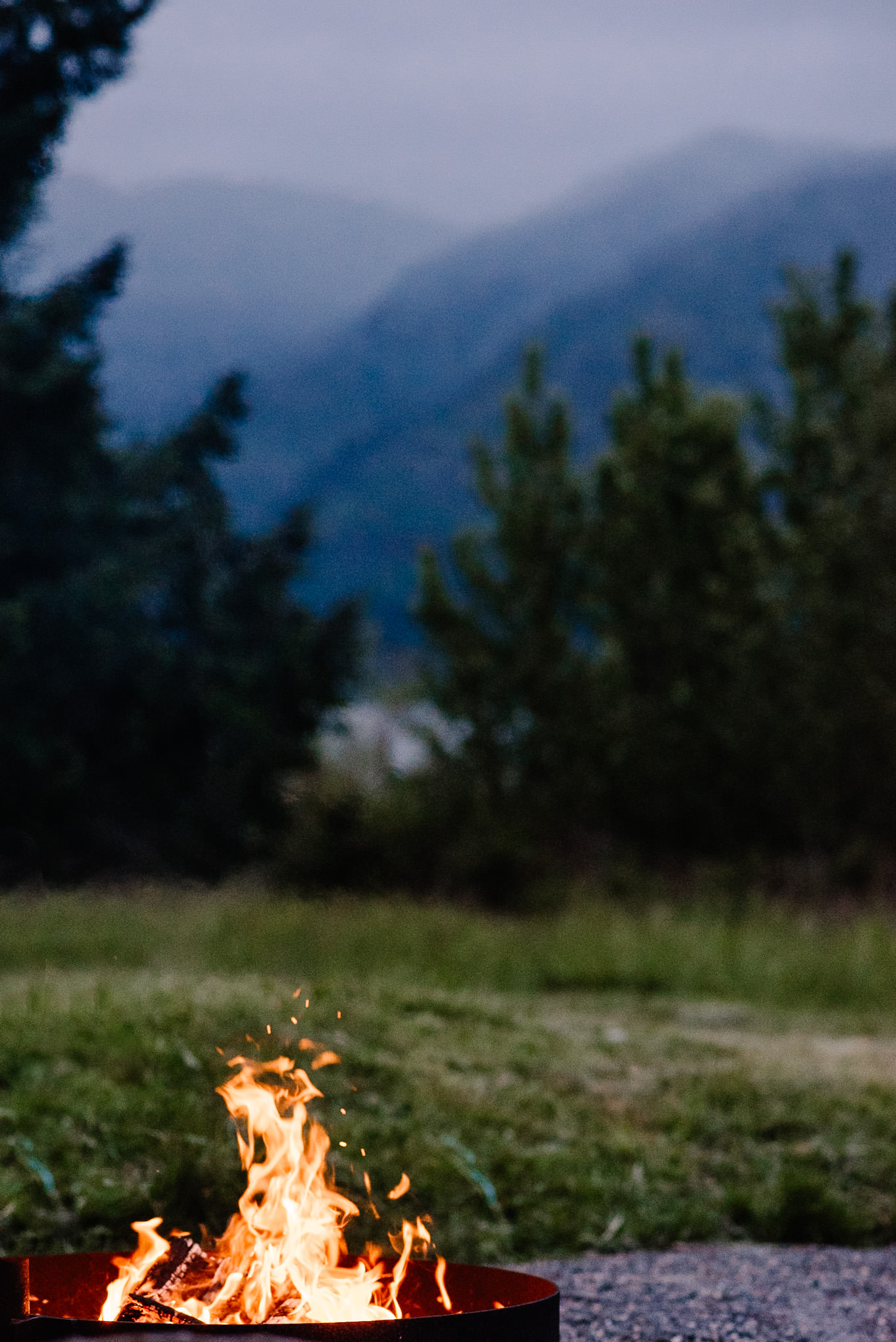 celebrating the people i've become retreat ceremony image of a fire in the mountains