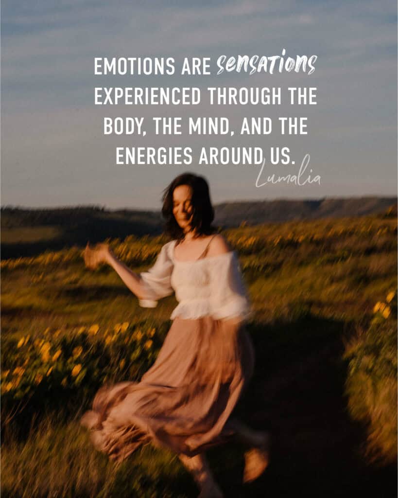 "Emotions are sensations experienced through the body, the mind, and the energies around us. - Lumalia" over image on how to control you emotions with a woman dancing near wild flowers