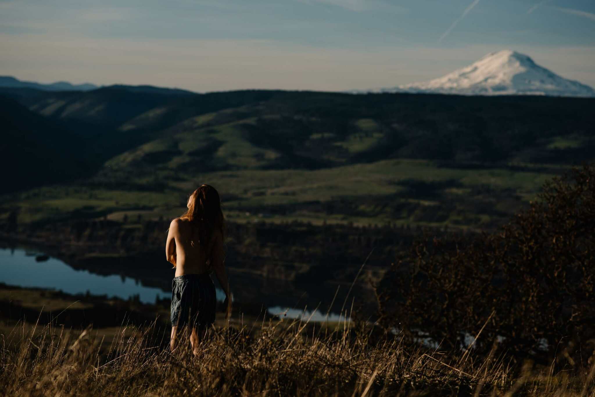 woman near a mountain embodied healing example feeling her feelings