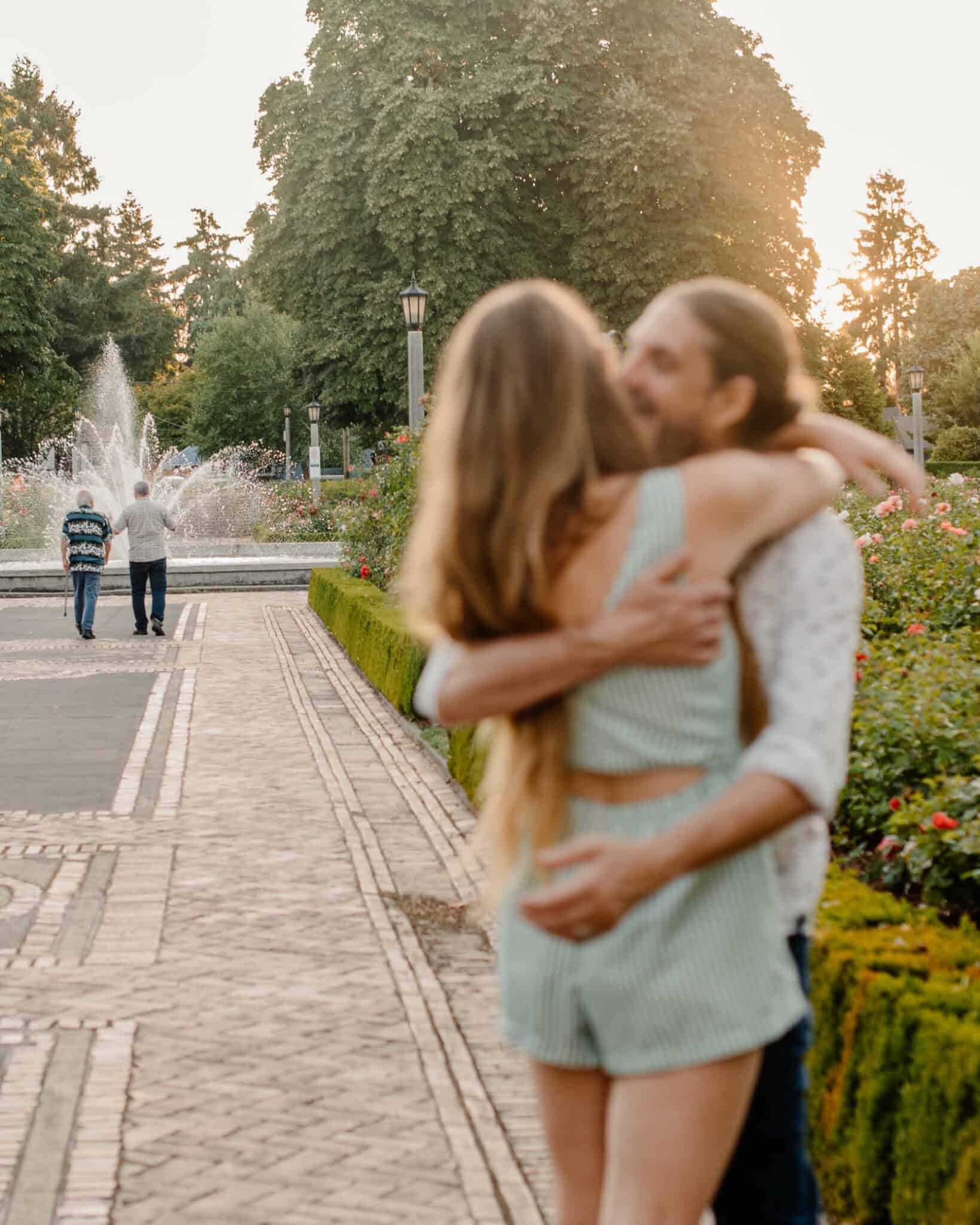 Lumalia and her husband out of focus with a couple in the background