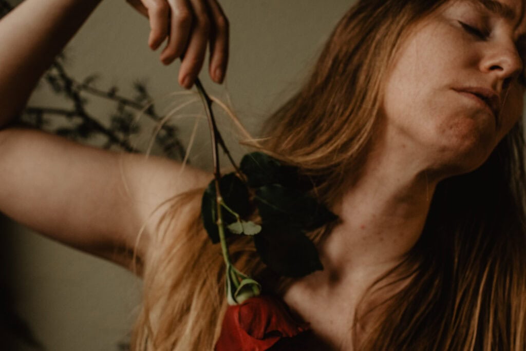 Lumalia with a rose flirting with the void