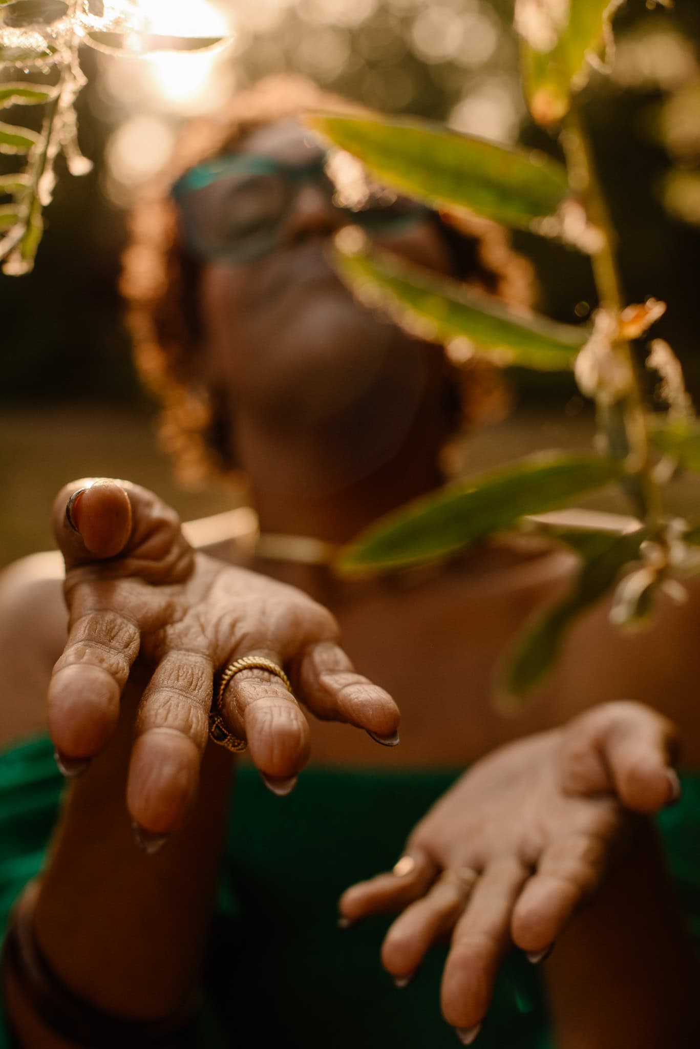 woman reaching her arms out after 30 day meditation challenge