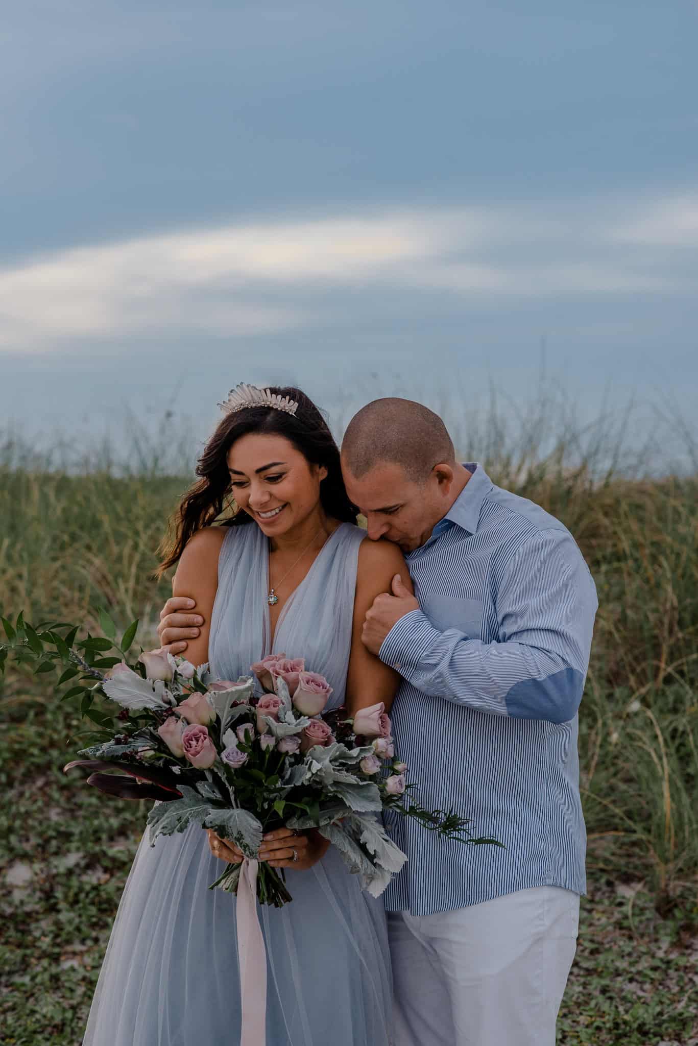 couple near ocean during anniversary couple photograhpy shoot with Celebrate Again