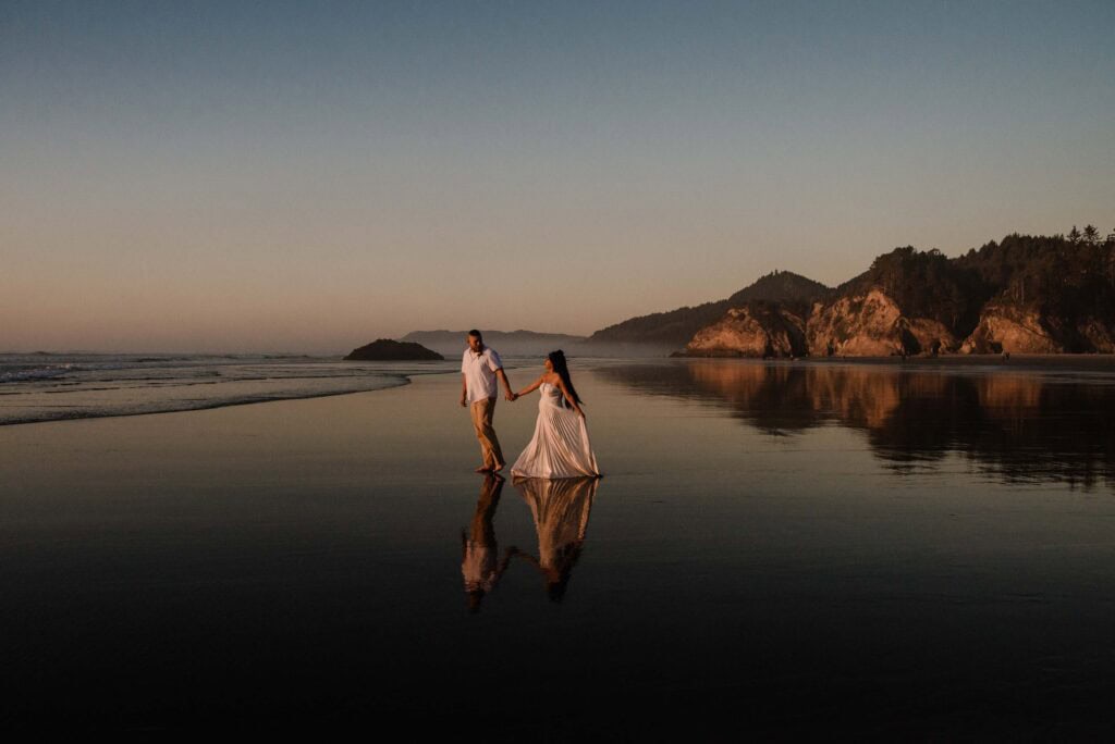 A couple walking near reflection of water near Portland Oregon for a Portland couples photography session with Celebrate Again