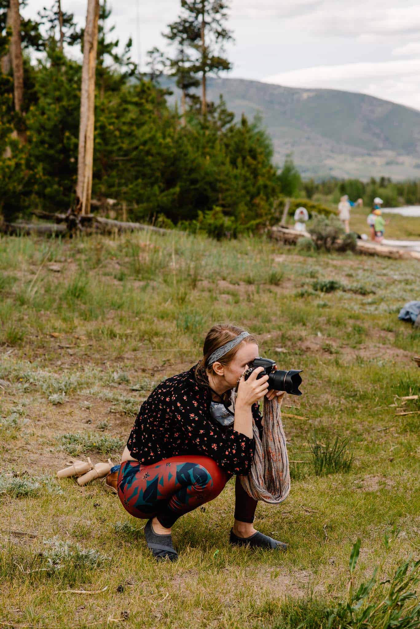 Lumalia near a river taking photos