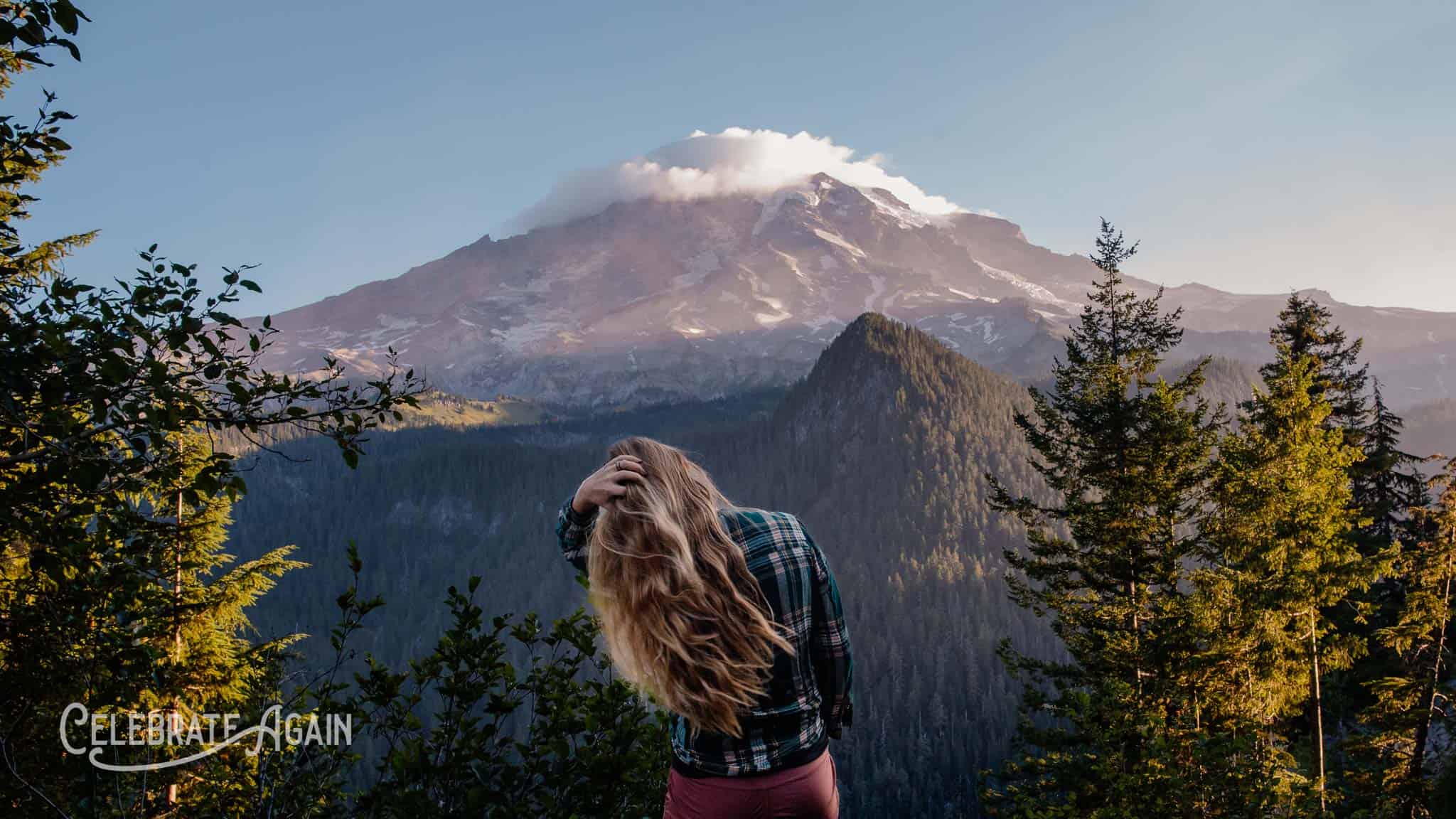 Woman in mountain background for poem about grief, longing and depression