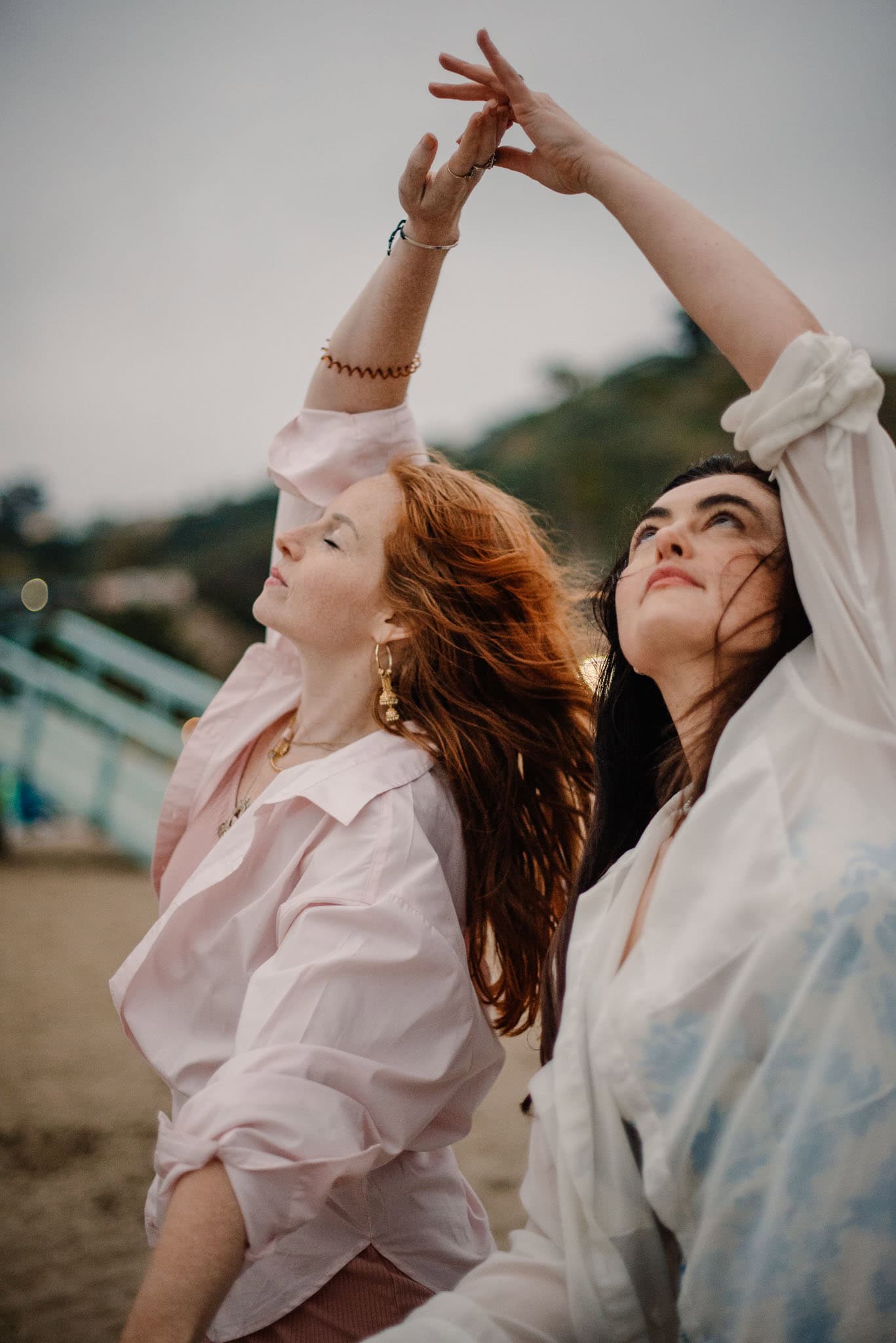 women with hands touching during an aliveness experiences