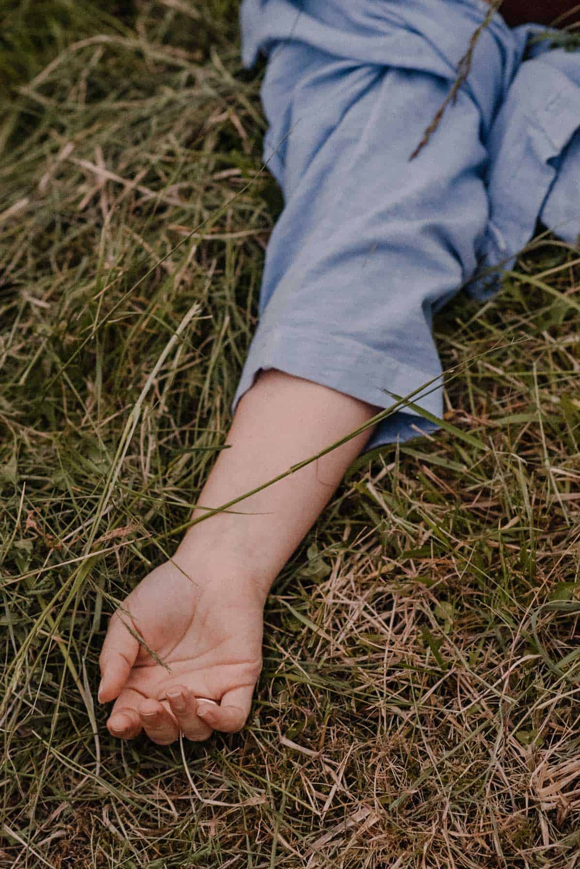 arm extended out in grass during rage retreat in oregon